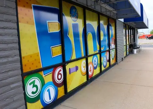 Building wrap and window graphics for local business in Wichita, Kansas by US Logo