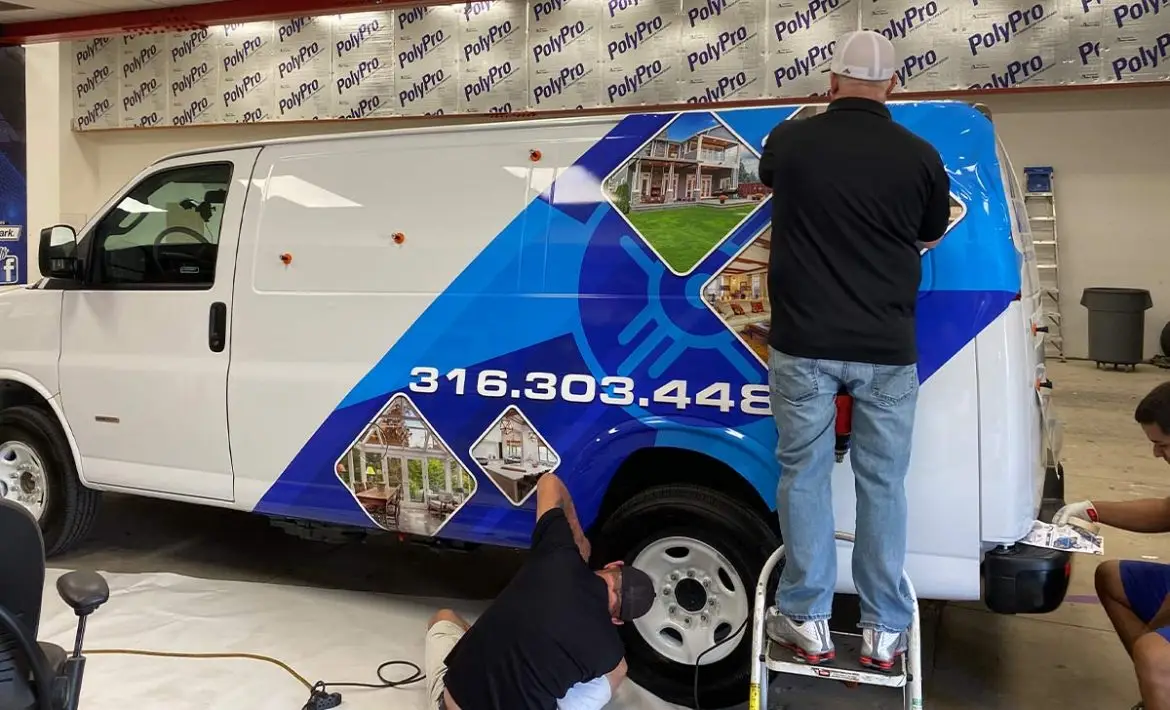 Branded company van and custom printed shirts in Central Wichita by U.S. Logo