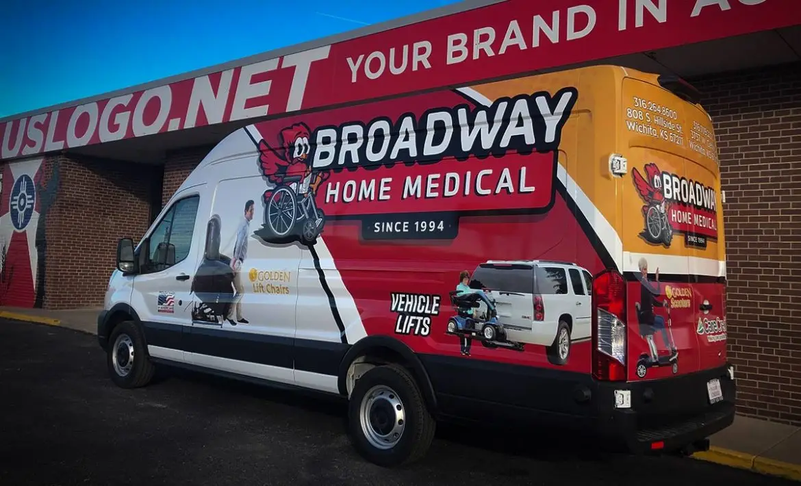 Downtown Wichita business van with custom wrap and branded team apparel by U.S. Logo